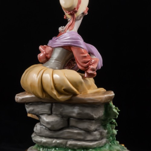 Сидящая дама с корзиной цветов, Bruno Merli, Италия