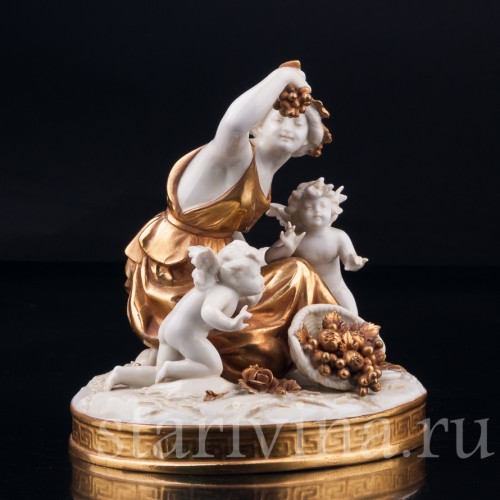 Старинная фигурка из фарфора "Осень", девушка с виноградом, Volkstedt, Германия, кон. 19 - нач. 20 вв.