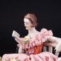 Фарфорвая статуэтка Грезы любви, девушка с книгой на диване, кружевная, Muller & Co, Германия, нач. 20 в.