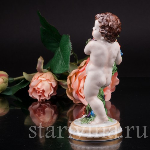 Фарфоровая статуэтка Путти с цветами, аллегория весны, Muller & Co, Германия, пер. пол. 20 в.