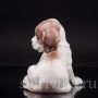 Статуэтка собаки из фарфора Сидящий щенок сенбернара, Nymphenburg, Германия, нач. 20 века.