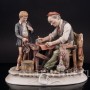 Композиция из фарфора Башмачник за работой, Pucci, Capodimonte, Италия, вт. пол. 20 в.