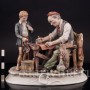 Композиция из фарфора Башмачник за работой, Pucci, Capodimonte, Италия, вт. пол. 20 в.