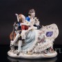 Статуэтка из фарфора Дама и кавалер с лютней на диване, кружевная, Sitzendorf, Германия, перв. пол. 20 в.